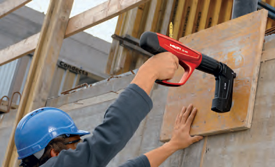 Working with a powder actuated tool